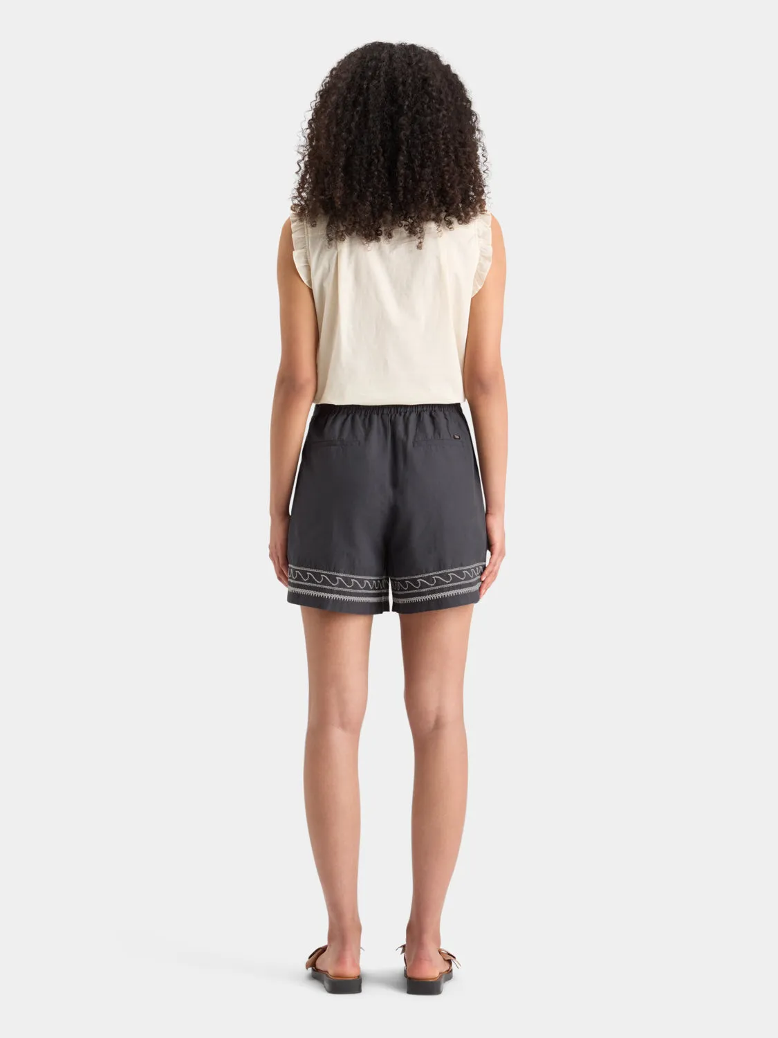 Palm embroidered high-rise linen shorts
