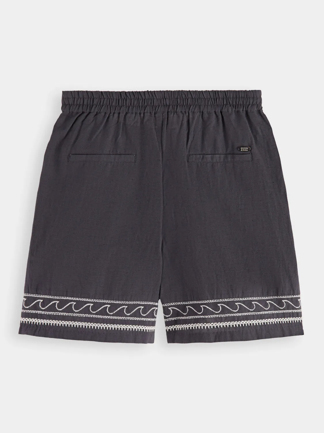 Palm embroidered high-rise linen shorts